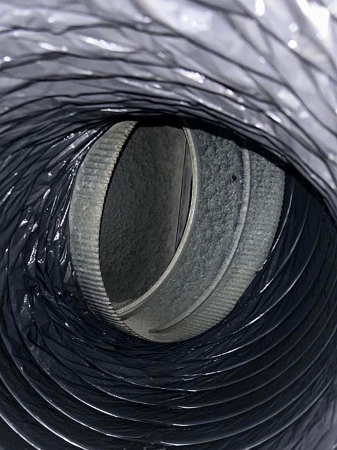 Duct interior showcasing buildup of dust and debris, emphasizing the need for professional duct cleaning services by 800 Duct.
